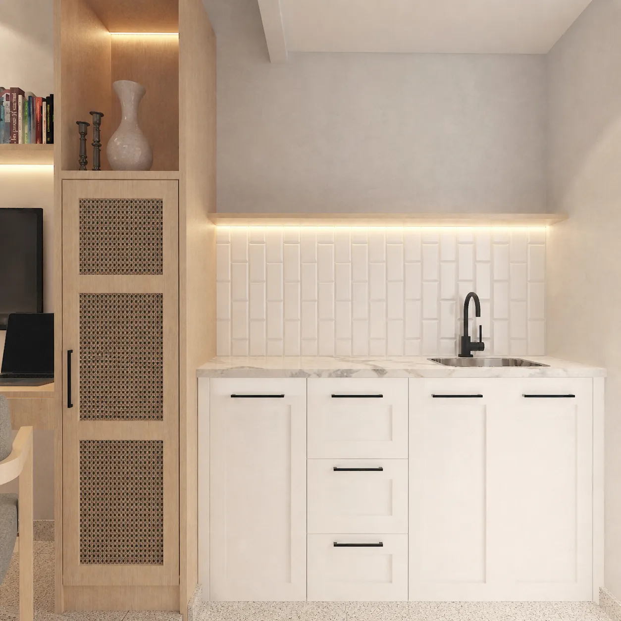 Kitchenette in a HAVN studio, with stone benchtop and integrated joinery